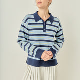 Face-forward posed view of a navy multi striped polo knit mini dress showcasing the sporty mixed-media silhouette.