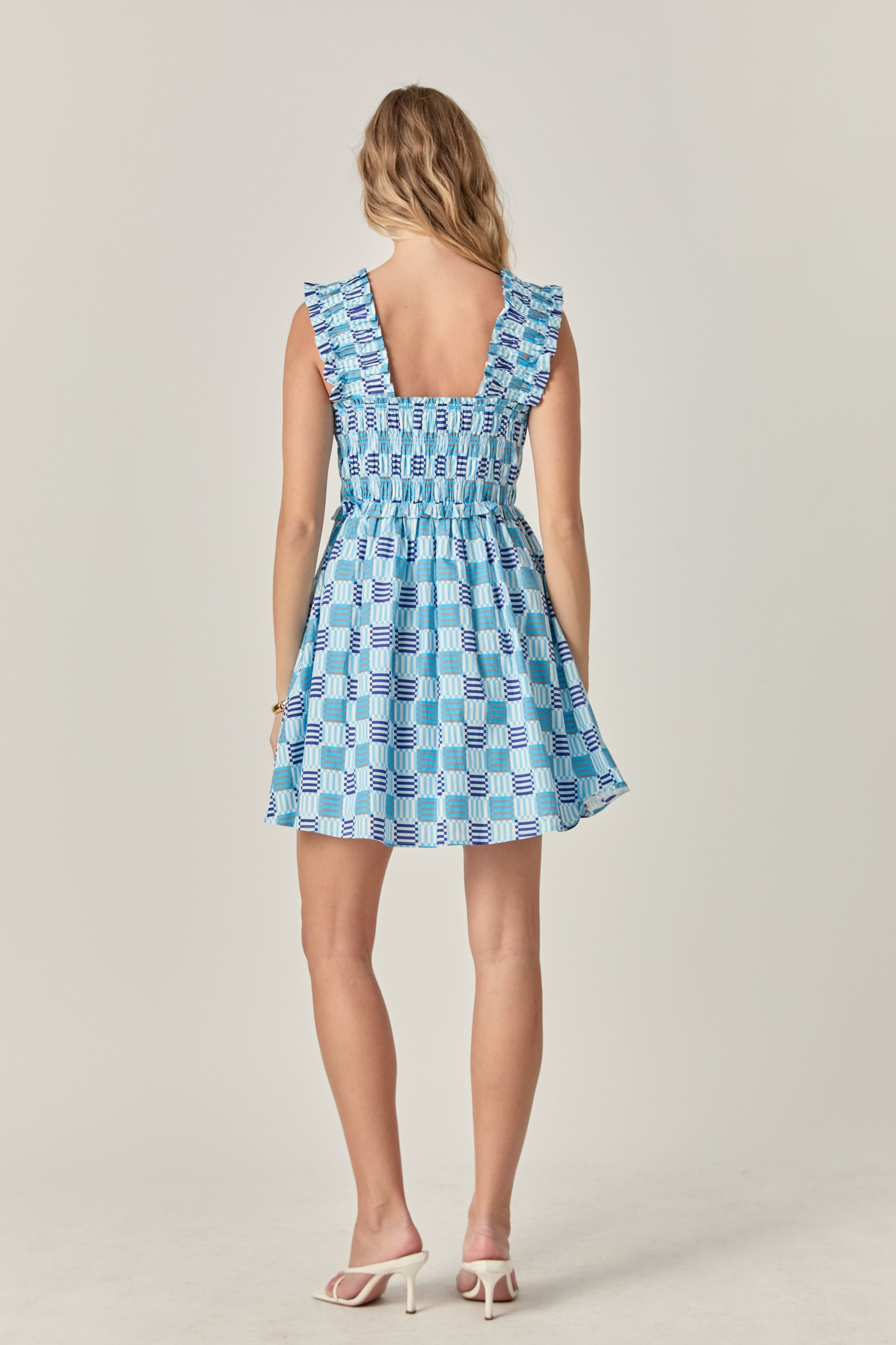 smocked ruffle mini dress THE DULCE TIERED SMOCKED RUFFLE DRESS IN PINK Large