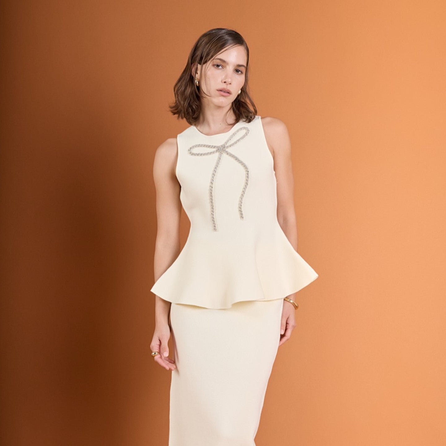 Peplum Bow Embellished Top