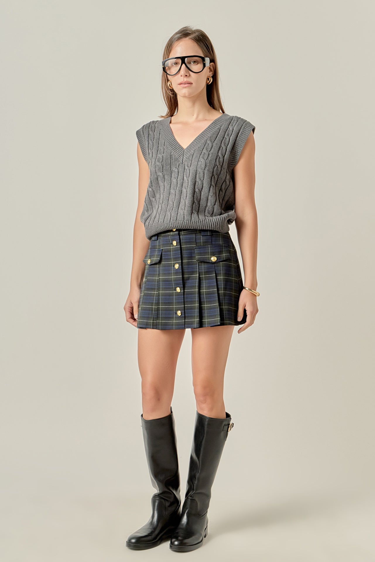 m me eme Classic check pleated skort MO&Co. Women's Asymmetric