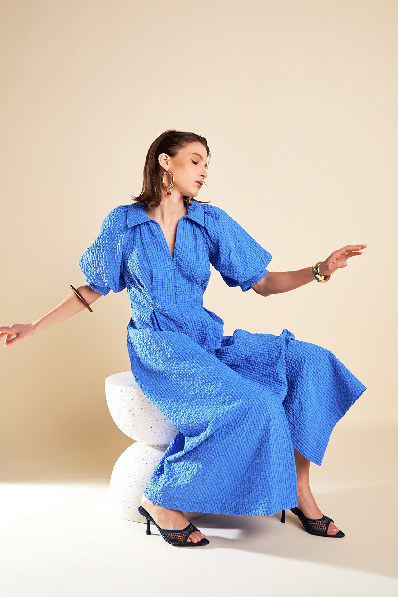Discover our Shirt Midi Dress featured in our latest editorial, "Crafted Contours: Where Fashion Meets Art"